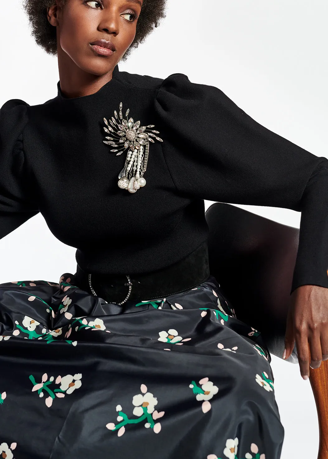 Black puffed-sleeve sweater
