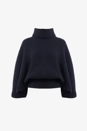 Short dark blue turtleneck cape